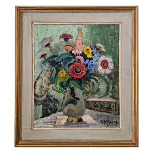 Framed oil painting of a colorful bouquet in a vase with wildflowers