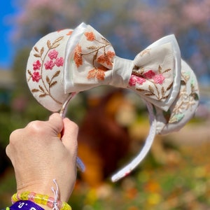 Cream floral Mickey ears headband with embroidered bow and white bow