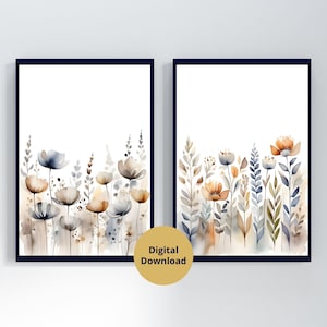 Set of two neutral wildflower watercolor prints in dark frames, beige and gray flowers