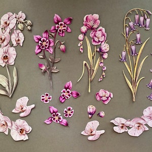 Die-cut floral blossom pieces bundle with pink, purple, and white flower shapes