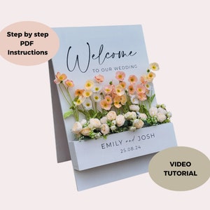 Floral wedding welcome sign card, 'Welcome to our wedding' and 'EMILY & JOSH'