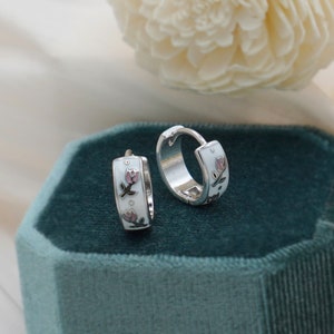 Silver tulip hoop earrings with red enamel flowers and small leaf details, hinged hoops