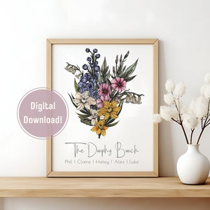Framed wildflower wall art print featuring pink and purple bouquet with greenery