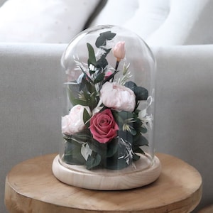 Glass dome bell with preserved roses and peony centerpiece