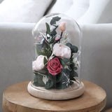 Glass dome bell with preserved roses and peony centerpiece