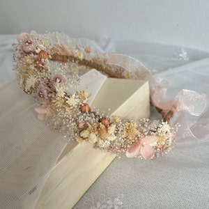 Dried flower crown with ivory and peach blooms and ribbon ties
