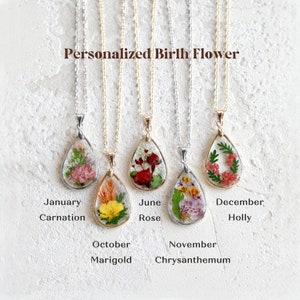 Teardrop pressed-flower necklaces with small bouquet pendants on gold-tone chains