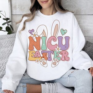 White sweatshirt with NICU Easter bunny nurse graphic on front