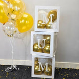 Mother's Day balloon box set with three white cubes and gold letter inserts