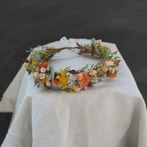 Dry flower wildflower crown wreath in orange, pink, and green