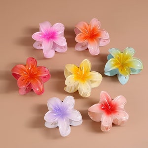 Set of pastel flower claw hair clips with hibiscus-style blossoms