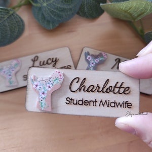 Personalized wooden engraved ID badge with name Charlotte and butterfly motif