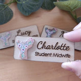 Personalized Tag ID badge 2D newborn baby aesthetic style. Baby in hands with flowers. Gift for midwife, doula, nurse. Wooden engraved.