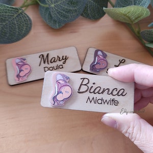 Personalized wooden ID badge with engraved names Mary Doula and Bianca Midwife, purple 2D baby