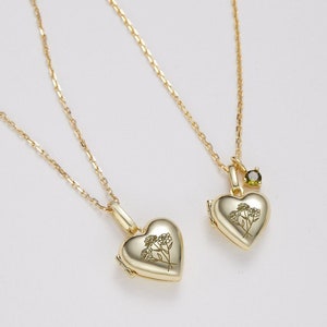 Gold-tone heart locket necklace with tree-engraved photo heart pendants