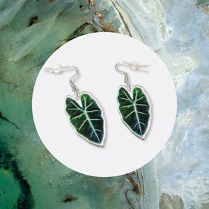 Leaf-shaped dangle earrings, dark green acrylic leaves with silver-tone hooks