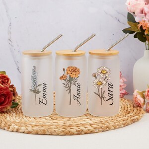 Frosted glass birth-flower tumblers with lids and straws, floral designs