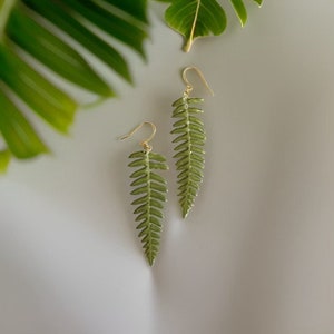 Fern leaf resin earrings with gold-tone hooks, pressed green leaf design