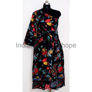 One-shoulder women’s dress with multicolor floral block print on dark, sleeveless