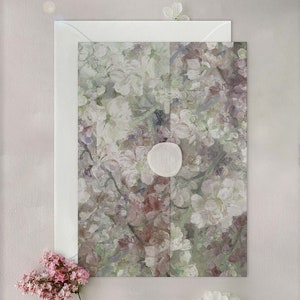 Floral translucent vellum wrap with soft pastel blooms and round cutout in center