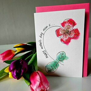 Mother's Day handmade greeting card with pink flower and blue leaf illustration