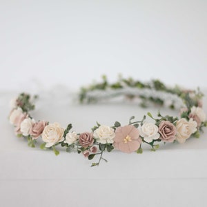 Dusty rose and blush flower crown with small white blooms and green leaves