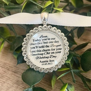 Silver round rhinestone charm with engraved wedding message and white ribbon loop
