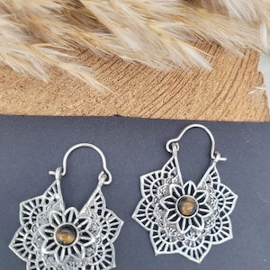 Silver mandala drop earrings with round tiger eye center and filigree flower design