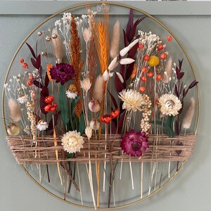 Gold circular hoop dried flower wreath with jute twine and mixed autumn blooms