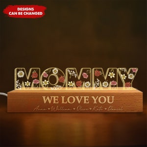 Wooden LED night light with flower-pattern letters reading "WE LOVE YOU"