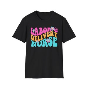 Black short-sleeve shirt with 'Labor & Delivery Nurse' colorful floral graphic