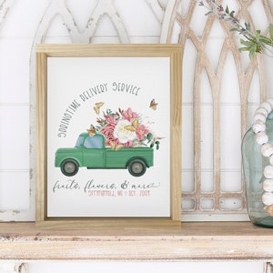 Framed farmhouse canvas wall hanging with green spring delivery truck and flowers