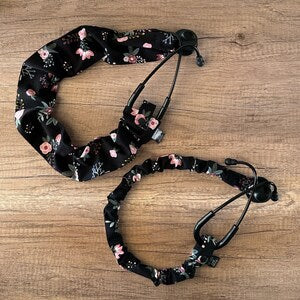 Black floral scrunchie set with pink and white rose pattern, elastic bow ties