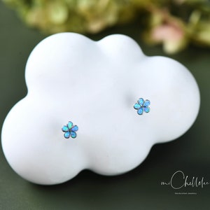 Sterling silver opal flower stud earrings with small blue flower designs