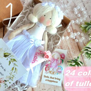 Handmade flower girl fabric doll in white tulle dress with floral headpiece