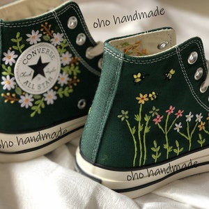 Green Converse high-top sneakers with floral and bee embroidery, canvas lace-up