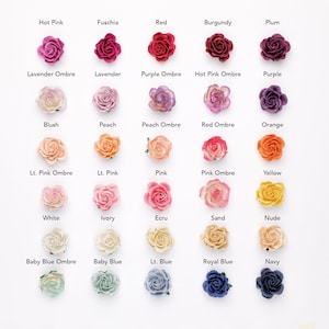Set of rose-shaped multicolor lapel pins with paper flowers and metal bases