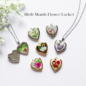 Heart locket necklace with pressed flower birth month designs in small round lockets