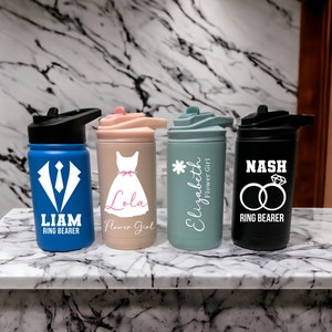 Personalized wedding tumblers with lids, blue, white, sage, and black designs