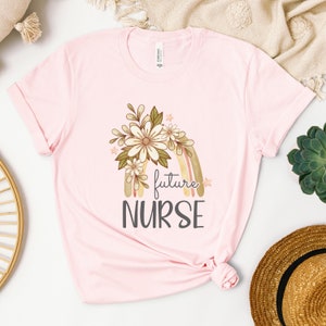 Pink nurse t-shirt with wildflower 'Future Nurse' graphic