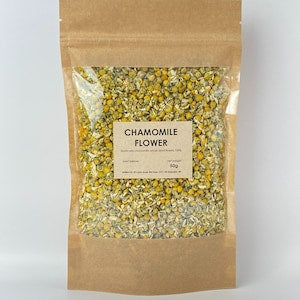 Dried chamomile flower tea in kraft pouch with herb label