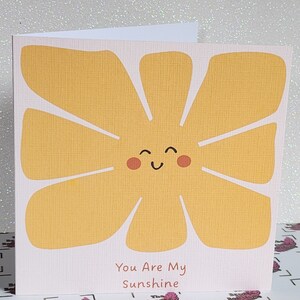 Handmade flower greeting card with yellow sunshine design and text “You Are My Sunshine”