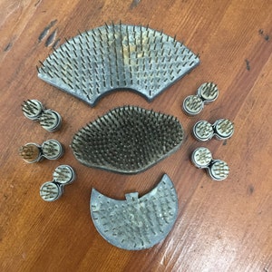 Set of metal flower frogs: three fan-shaped mesh pieces and six small round discs