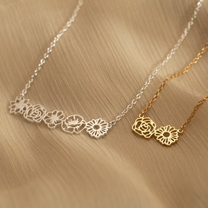 Floral birth-flower style pendant necklace, gold and silver filigree flower charms on chain