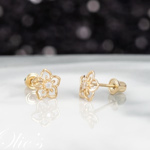 14k yellow gold flower stud earrings with clear CZ stones, minimalist floral design