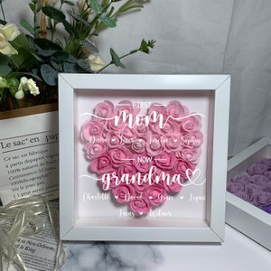 White shadow box with pink rose heart and script text 'Mom' and 'Grandma'.