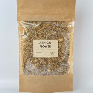 Natural dried arnica flower in sealed kraft pouch with clear front window