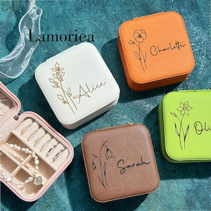 Engraved birth flower jewelry box with name and floral line-art on lid, multiple colors.