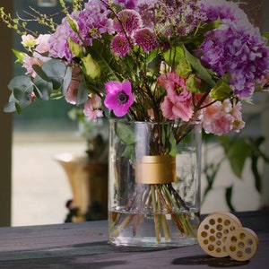 Flower bouquet maker tool with perforated round head for arranging stems in vases