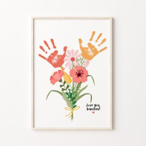 Framed printable flower handprint art with colorful handprints and blooming bouquet